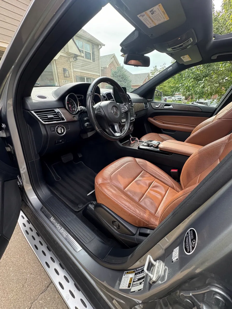 Mercedes-Benz GLE front seats and dash after a full interior detail, cognac leather cleaned and conditioned