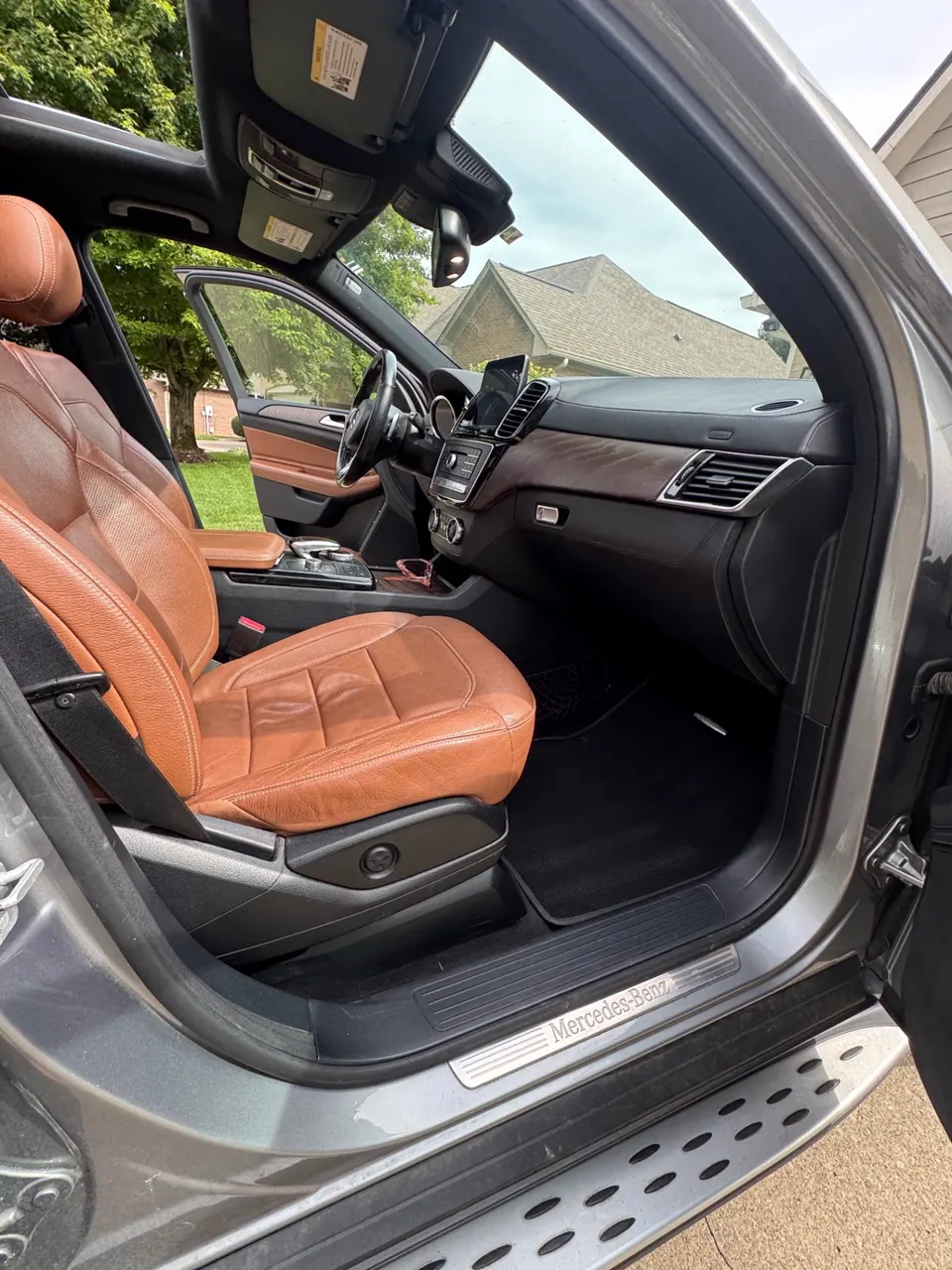 Detailed Mercedes-Benz GLE passenger seat, dashboard and door sill after a full interior clean